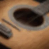 Close-up of guitar strings and fretboard with intricate notes.